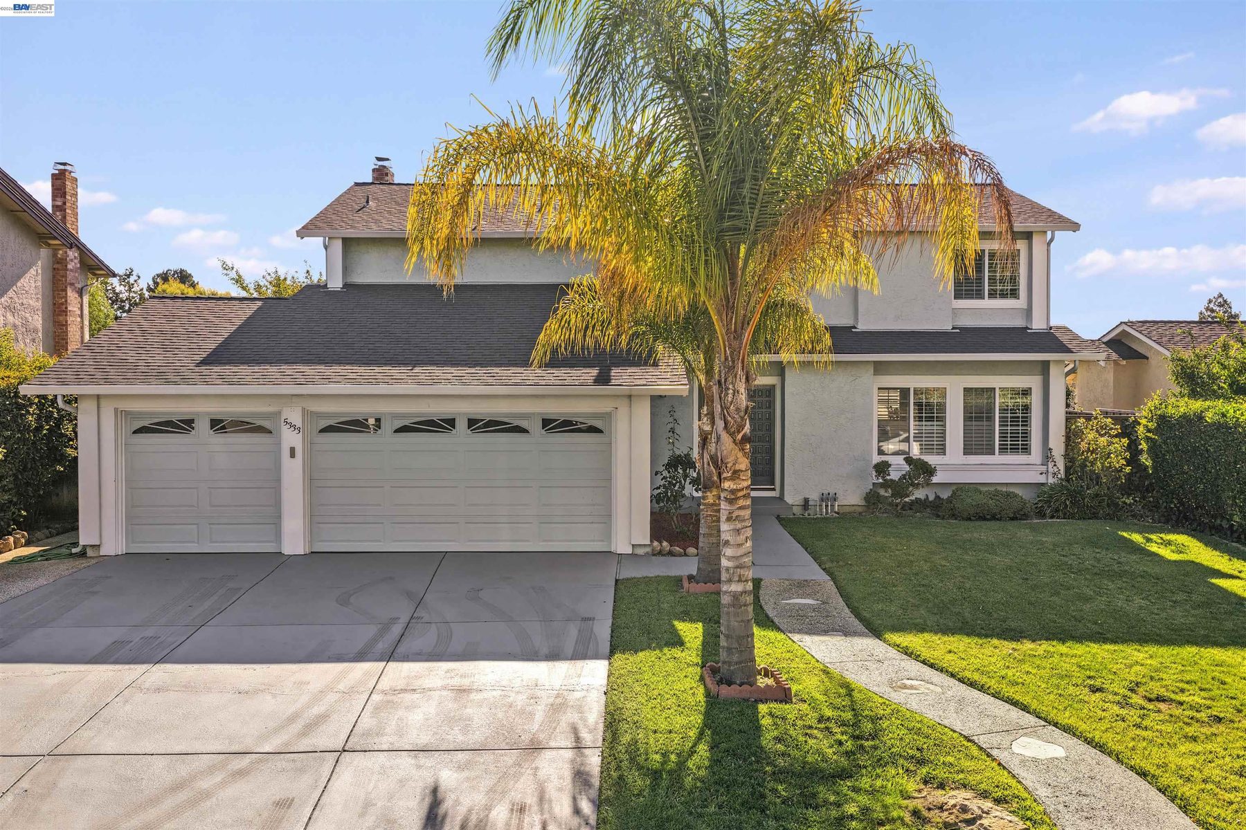 Daytime view of the three-car garage