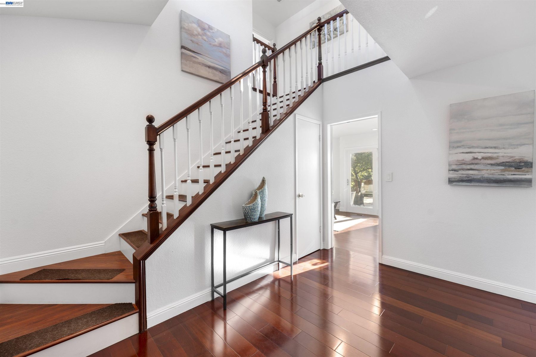 Staircase rising to the second level from the entry