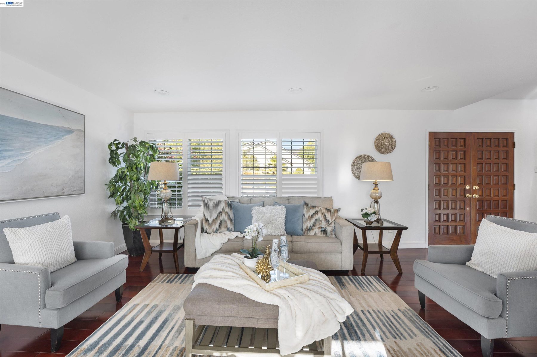 Living room seating area with natural light