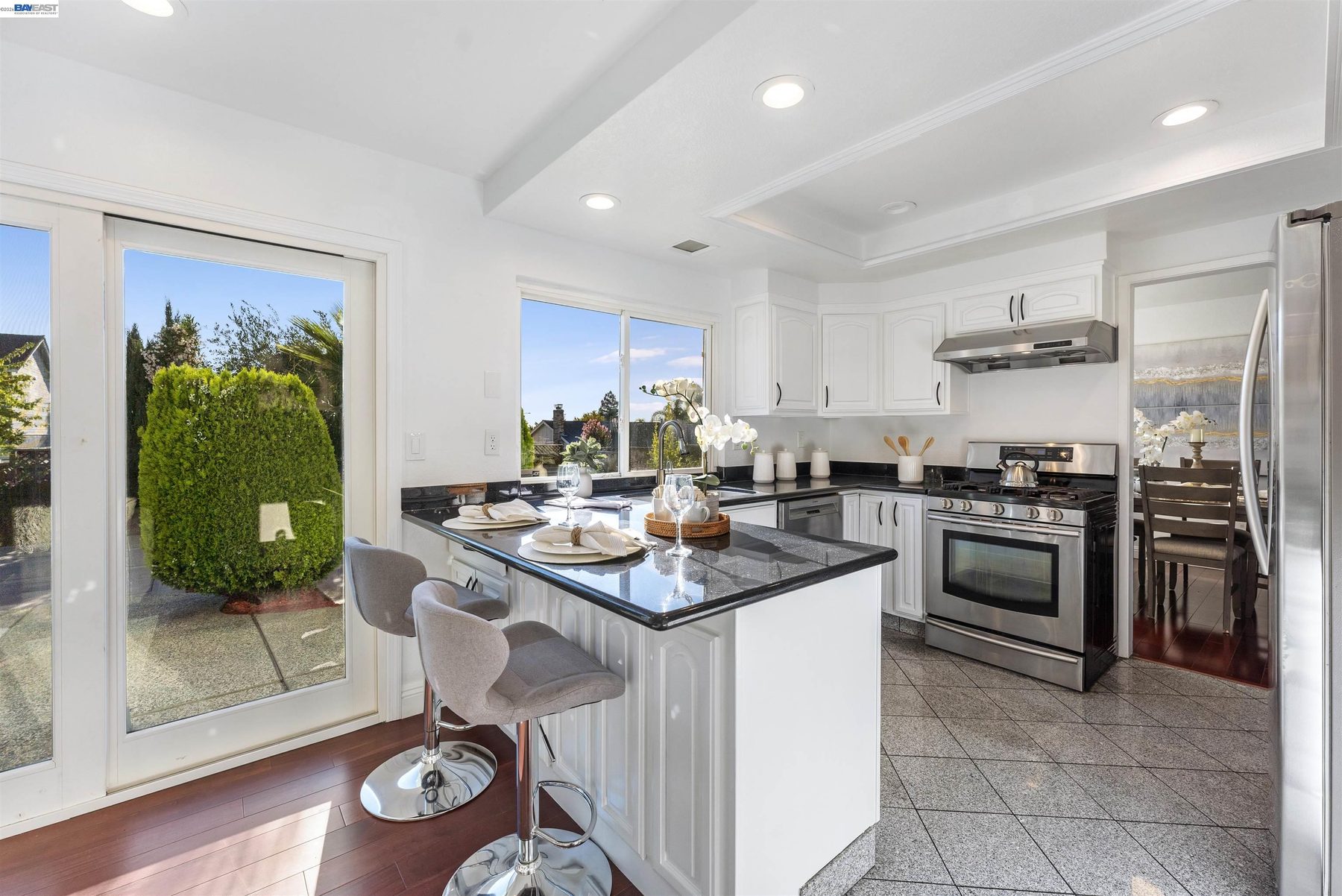 Kitchen island with granite counters and bar seating