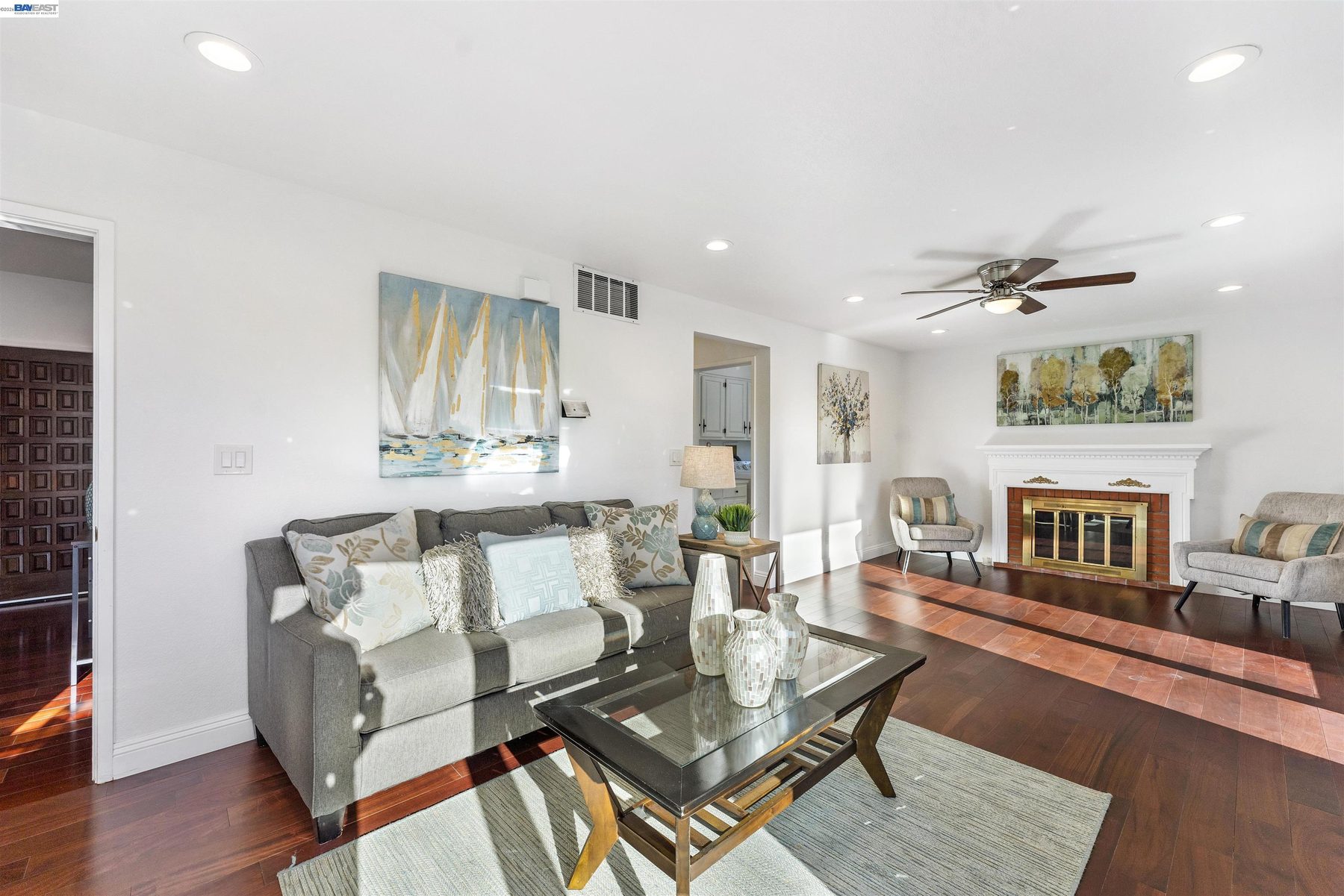 Family room with fireplace and hardwood floors