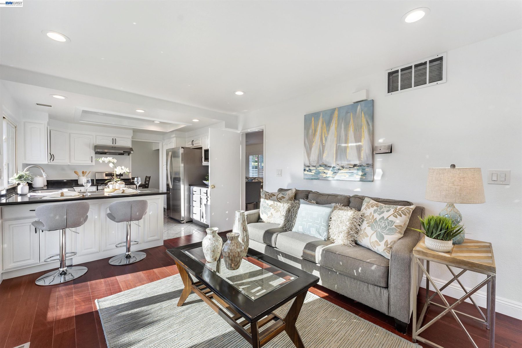 Family room open to the kitchen bar